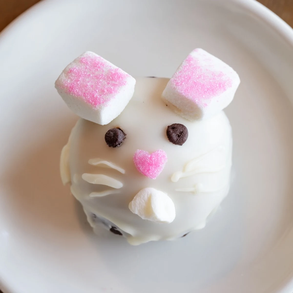 Adorable Bunny Oreo Balls dipped in smooth white chocolate with cute marshmallow bunny ears and pink sugar details