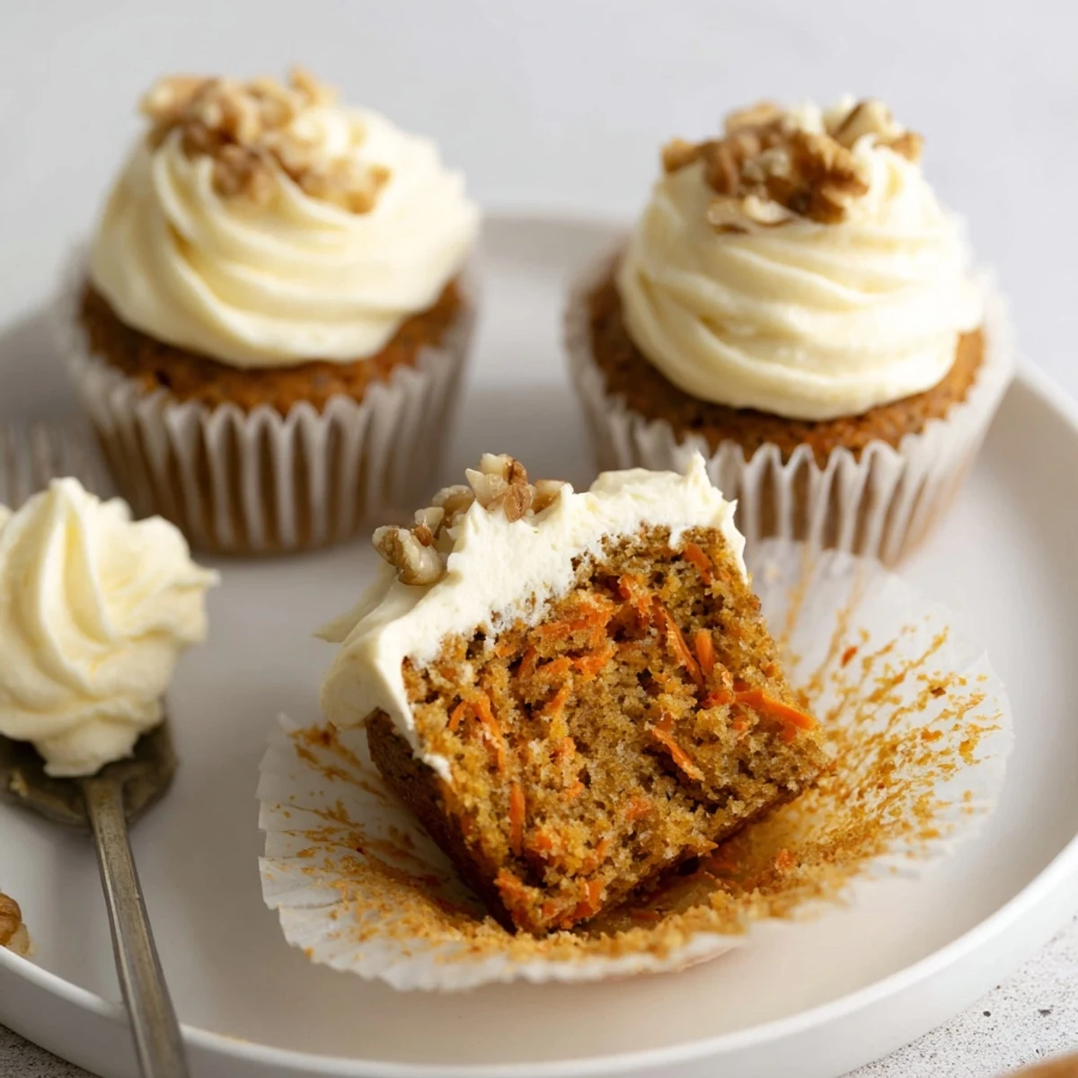 Warm Moist Carrot Cake Cupcakes cooling on wire rack, spiced aroma