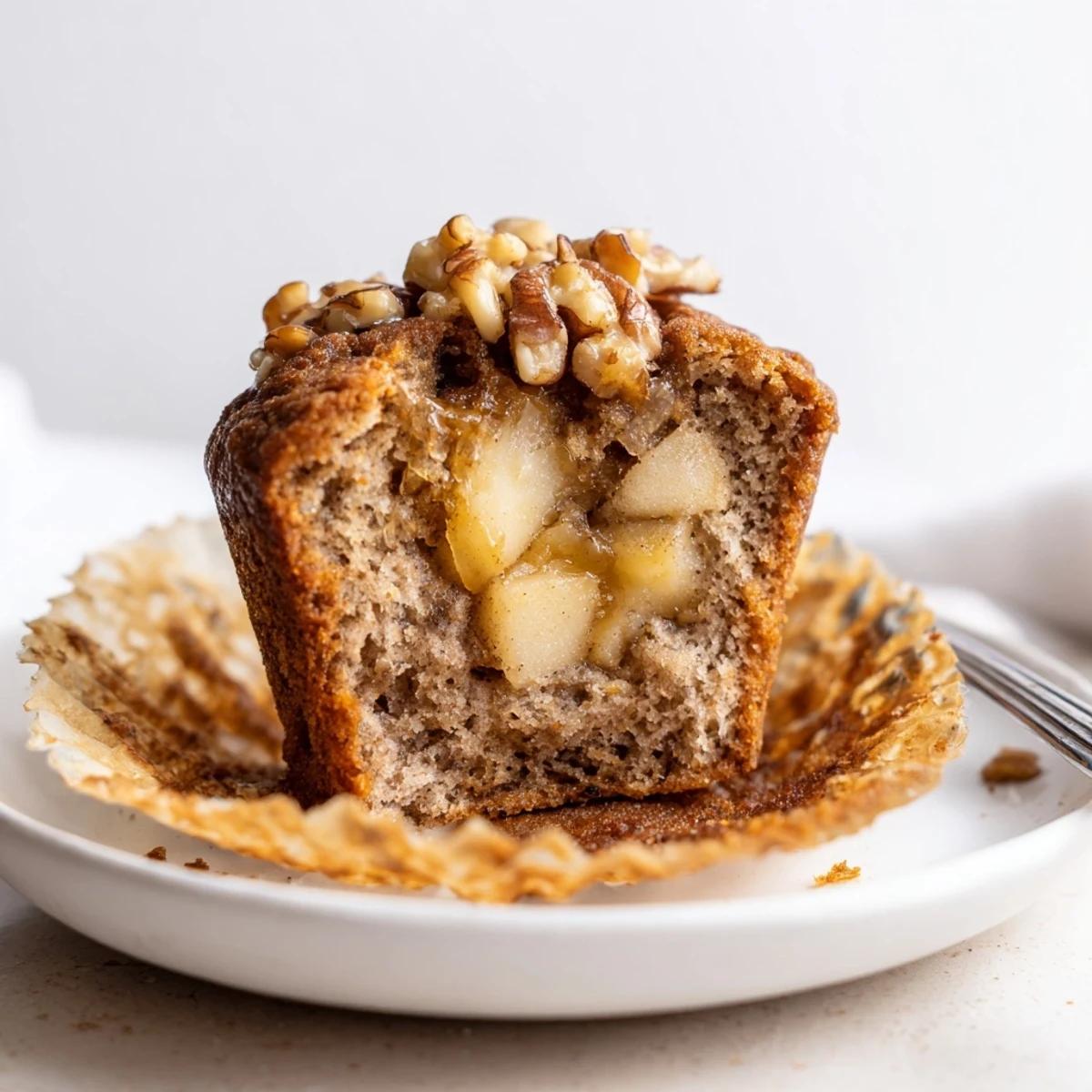 Healthy Apple Cinnamon Greek Yogurt Muffins steaming on a rack, apples and cinnamon aroma