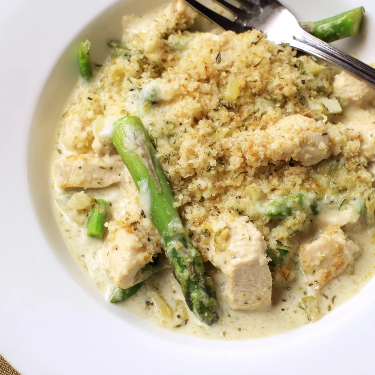 Fresh from oven Creamy Chicken Asparagus Bake steaming, cheesy, ready to serve