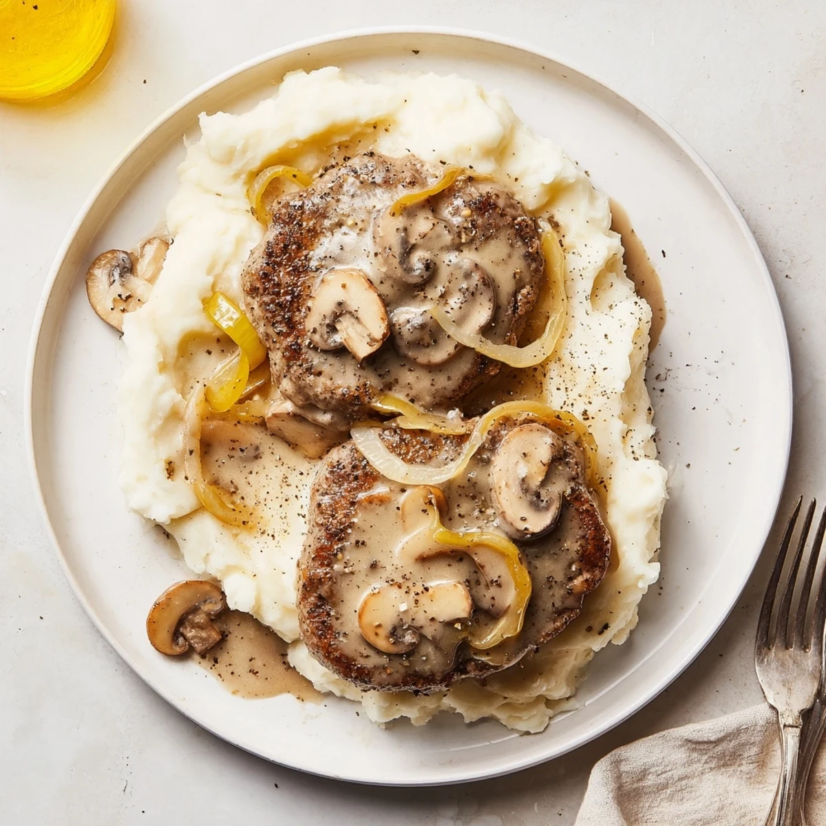 Savory Country Style Smothered Cube Steak Recipe with caramelized onions and mushrooms